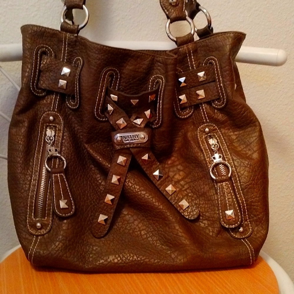 Large brown studded 👛 many of zipper compartments in/out comfortable straps